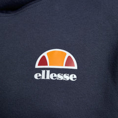 Close-up zoom on the fabric of the Ellesse Toce Overhead Hoodie in navy, showing the soft fleece texture and the embroidered or printed Ellesse logo.