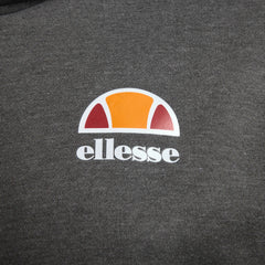 Close-up zoom on the fabric of the Ellesse Toce Overhead Hoodie in charcoal, showing the soft fleece texture and the embroidered or printed Ellesse logo.