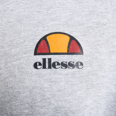 Close-up zoom on the fabric of the Ellesse Miletto Full-Zip Hoodie in light grey, showing the soft fleece texture and the embroidered or printed Ellesse logo.