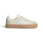 Side Profile Image: Studio lateral shot of the adidas Sambae in light beige leather and white, highlighting the smooth upper, embroidered white three stripes, silver foil SAMBA lettering, and a thick see-through gum rubber platform outsole.