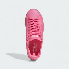 Top-down view of a pair of Adidas Originals Superstar Jelly Women's trainers in clear, highlighting the translucent upper and lace-up closure.