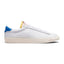 Side profile of the Nike Tennis Classic AC in White and Light Photo Blue showing full-grain leather upper, perforated Swoosh, and vulcanised rubber sole.