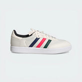 Side Profile Image: The Chalk White Velosamba, highlighting the multicolour 3-Stripes and the recessed cleat area in the white outsole.