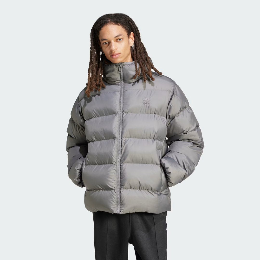 Adidas Tonal Hooded Puffer Jacket Men's in grey showing a model wearing the jacket along with suitable clothing