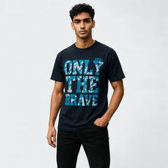 Man wearing a black t-shirt with 'Only the Brave' text on a white background