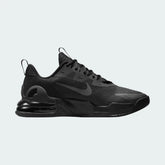 Nike Air Max Alpha Trainer 5 Men's shoes in black and dark smoke grey, side profile showing visible Max Air unit in the heel, durable mesh upper, and supportive overlays.