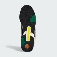 View of the outsole of the Adidas ZX 4000 Men's grey trainers, showing the durable rubber tread pattern with the Torsion System bridge.