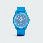 Adidas Originals Project One R Watch in blue, front view showing the digital display with a white Trefoil logo on the face.