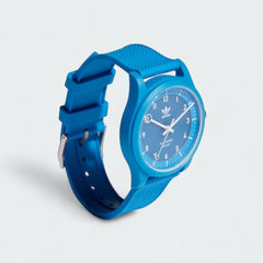 Adidas Originals Project One R Watch in blue, side profile showing the thickness of the case and the texture of the silicone strap.