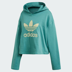 Adidas Premium Hoodie Trefoil Overhead Women's in noble green, front view showing adjustable hood, prominent metallic gold Trefoil logo, and a kangaroo pocket.