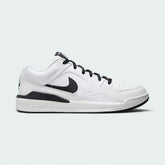 Side Profile Image: Highlights the White leather panels, the black swoosh and the Formula 23 foam midsole.