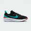 Highlights the high-velocity sweep of the contrasting Dusty Cactus teal Swoosh, showing the professional, multi-textured black mesh upper, the vibrant Bright Crimson lace loop accents, and the clean white foam midsole wall moving up to the specialized flexible heel frame.