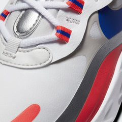 Close-up zoom on the front of the Nike Air Max 270 React Women's trainers, showing the multi-layered, no-sew upper texture, lacing system, and vibrant color blocking.