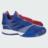 Adidas T-Mac Millennium men's basketball sneakers in blue and red with white accents, side profile showing textile upper, Boost midsole, and classic T-Mac design details.