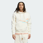 Adidas Logo Play Hoodie Men's in cream white, front view showing the unique Adidas logo graphic on the chest and a kangaroo pocket as worn by the model