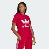 adidas Adicolor Trefoil Women's Tee H33563 worn standing showing relaxed fit and bold colour
