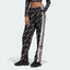 A pair of black Adidas Adibreak track pants with white stripes and monogrammed Adidas logos, featuring a drawcord on elastic waist.