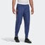 Front image showing the pants being worn with cuffed ankles and the arsenal logo