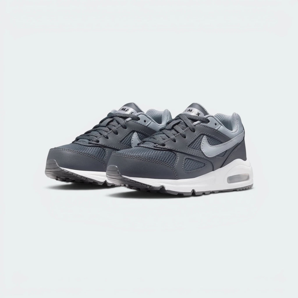 Emphasising the clean lines of the low-top aerodynamic silhouette and the professional alignment of the grey gradient panels.