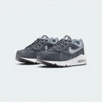 Emphasising the clean lines of the low-top aerodynamic silhouette and the professional alignment of the grey gradient panels.