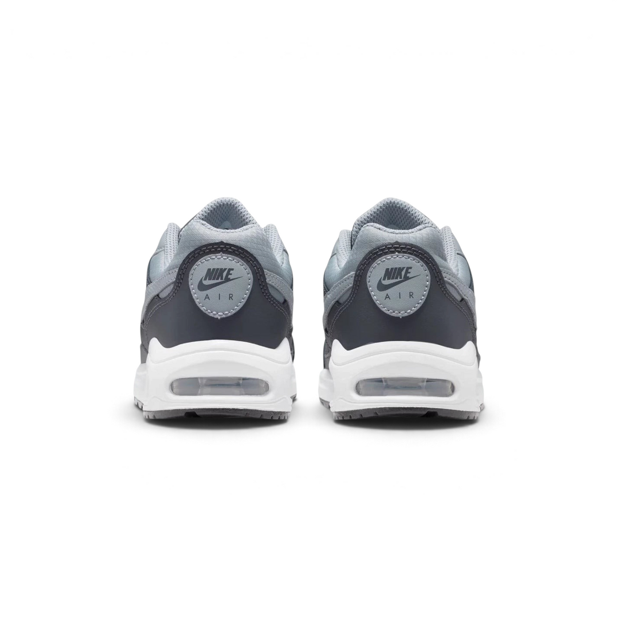 Focuses on the contoured rear paneling featuring the classic embroidered Nike Air branding and the clean finish of the sole casing.