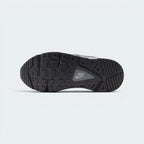 Displays the retro geometric rubber waffle tread pattern engineered for unreal multi-surface everyday grip.