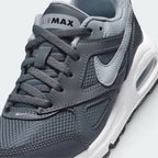 Details the high-definition textile weave on the toe box and the precision double-stitching around the front leather mudguards.