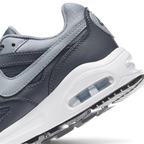 Highlights the "unreal" clean finish where the visible Max Air heel window cuts through the stable foam midsole wall.