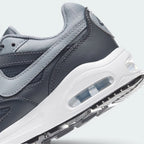 Highlights the "unreal" clean finish where the visible Max Air heel window cuts through the stable foam midsole wall.