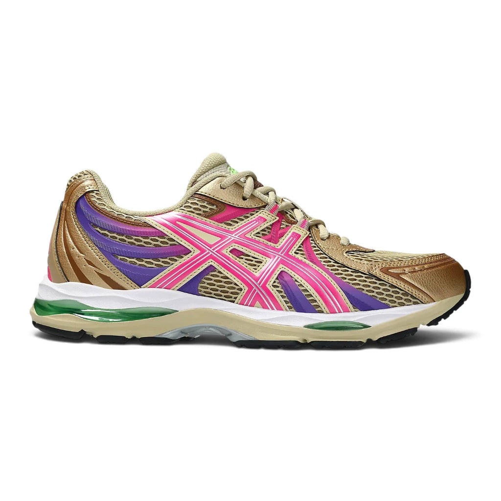 Side Profile Image: Studio lateral shot of the ASICS GEL-SEKIRAN in Sand and Pink Gold, highlighting the technical mesh upper, layered synthetic overlays referencing heritage running models, the side ASICS branding, and the cushioned foam and GEL midsole tooling.