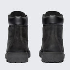 Rear view of the Timberland 6 Inch Premium Juniors' black boots, focusing on the structured heel and robust stitching.
