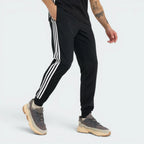 Emphasising the locked-in tapered silhouette and the professional "Black" colour depth.
