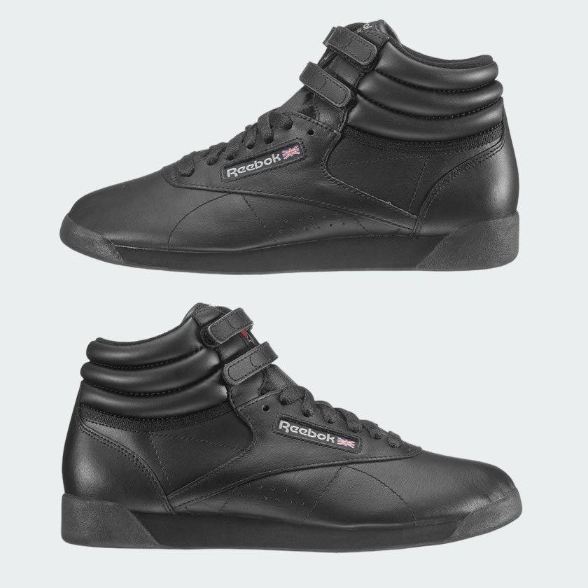 Reebok Freestyle Hi 2240 in black - styled on a foot, showing high-top fit