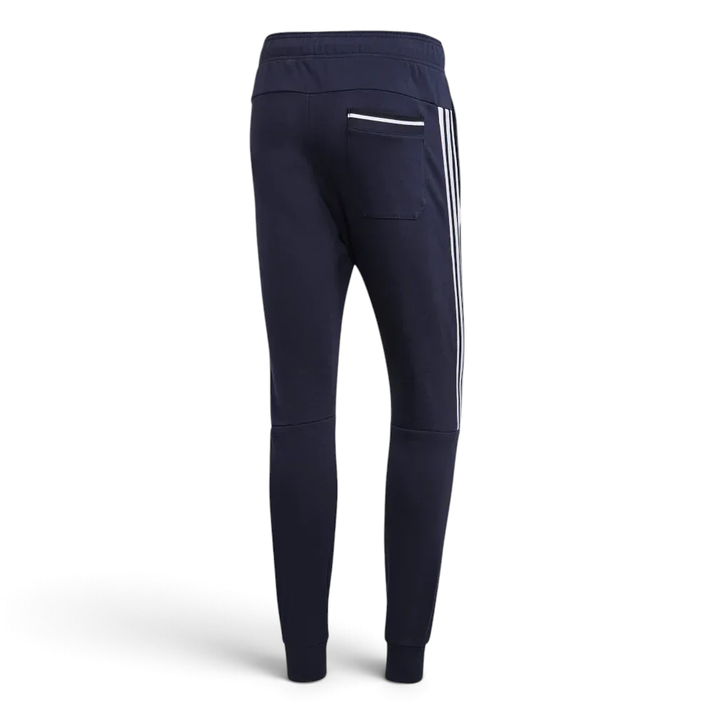 Navy blue jogger pants with white stripes on a light gray background