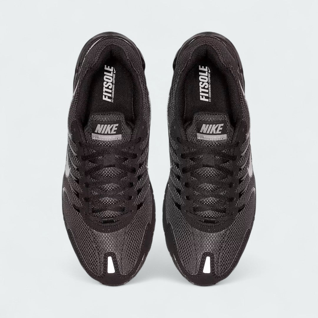 Top-down view of a pair of Nike Air Max Torch Men's running trainers in black, highlighting their streamlined silhouette and lace-up closure.