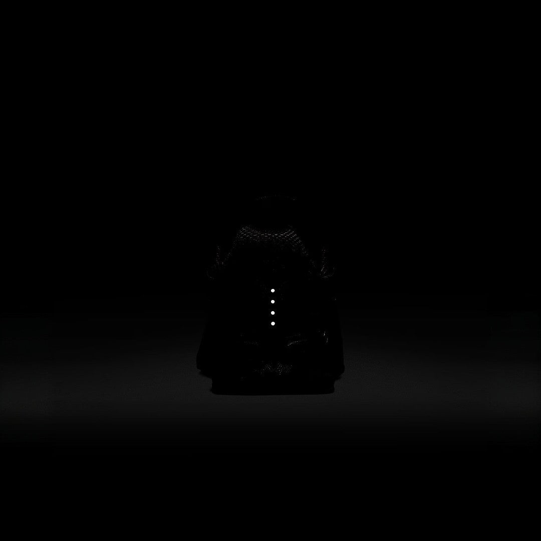 Shot taken in the dark showing the reflective marks on the shoes making them ideal for night running