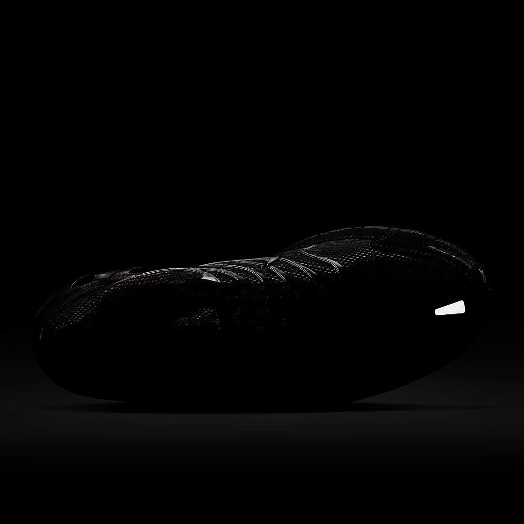 Shot taken in the dark showing the reflective marks on the shoes making them ideal for night running