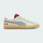 Puma Suede x Coca-Cola Unisex trainers in white suede with a red Formstrip, side profile showing the classic silhouette and a Coca-Cola branded heel tab.