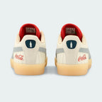 Rear view of the Puma Suede x Coca-Cola Unisex trainers, focusing on the Coca-Cola branding and red heel tab.
