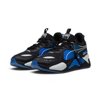 Angled view of two Puma RS-X x PlayStation Unisex trainers in black, side by side, showcasing their chunky silhouette and multi-colored gaming accents.