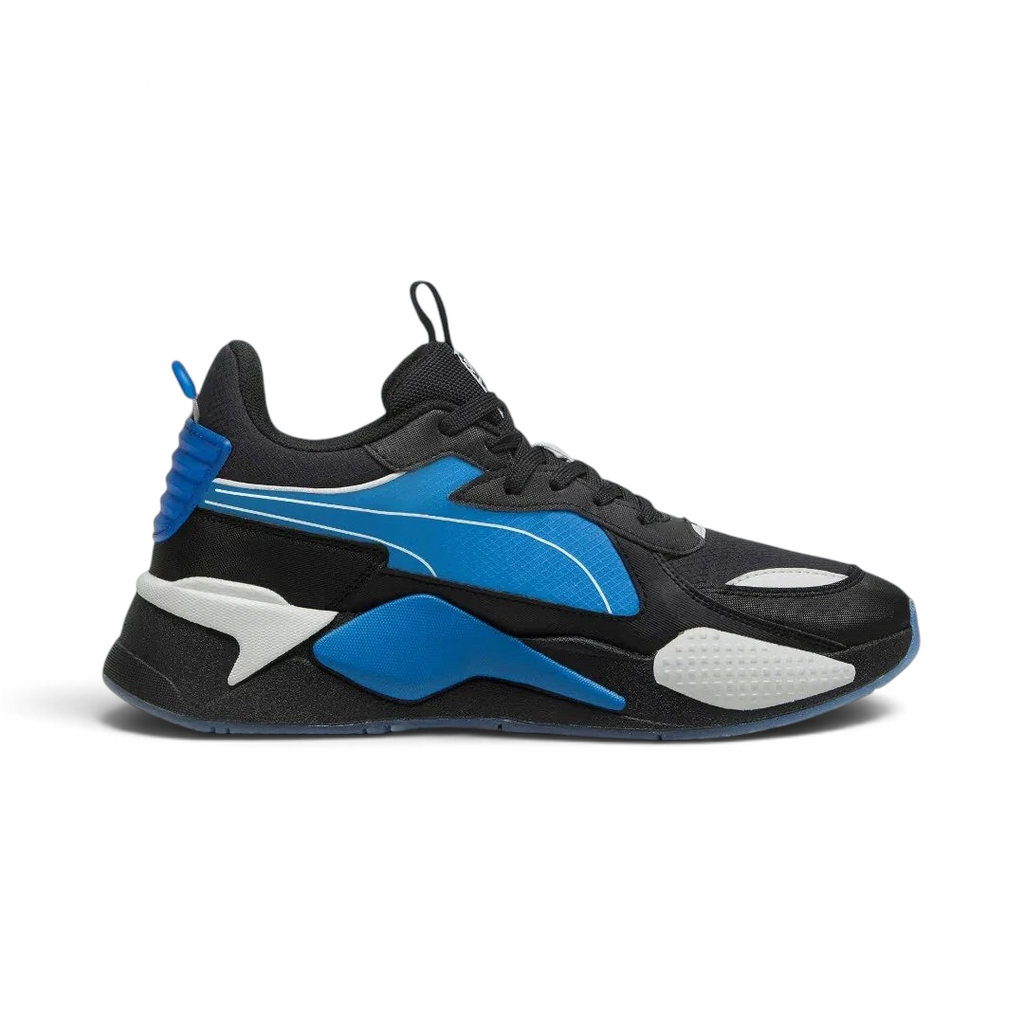 Puma RS-X x PlayStation Unisex trainers in black, inside profile showing layered upper, thick sole with RS cushioning, and PlayStation logo.
