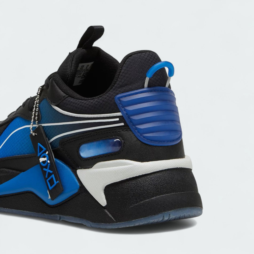Rear view of the Puma RS-X x PlayStation Unisex trainers, focusing on the textured heel counter and PlayStation branding.