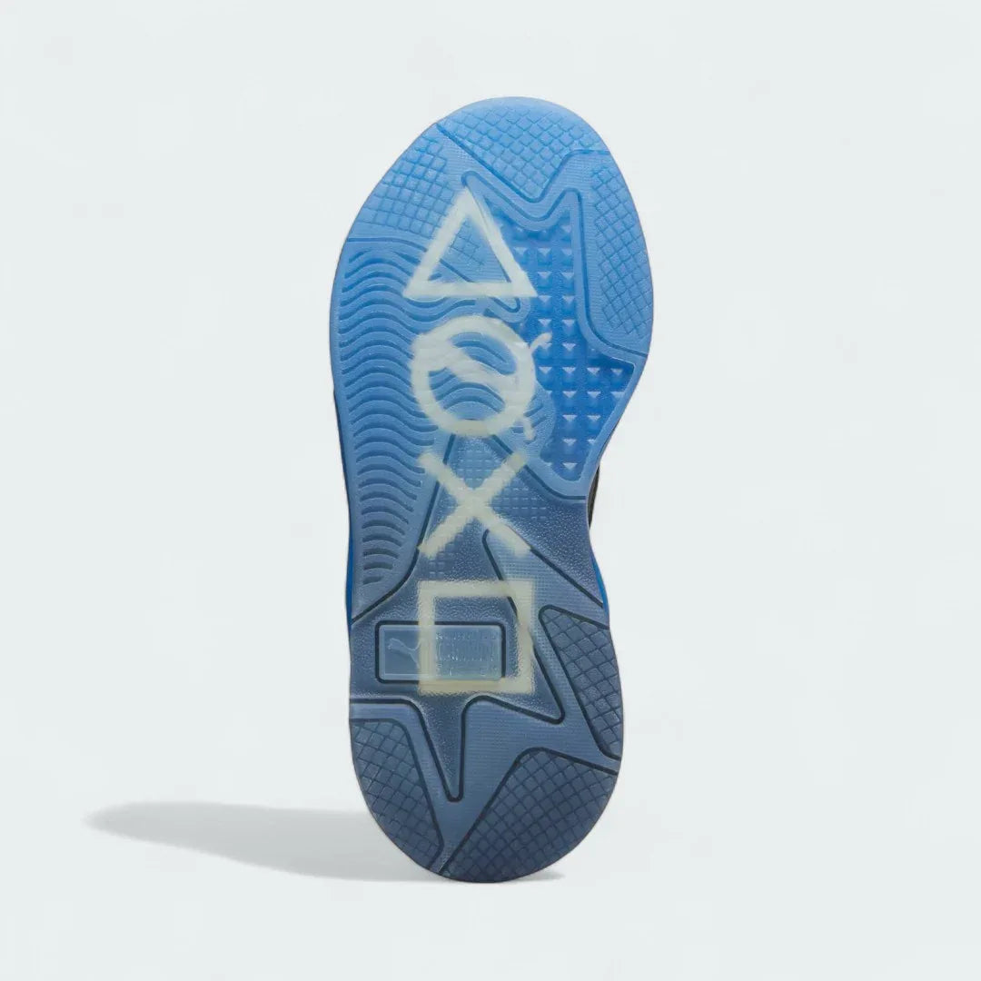 View of the outsole of the Puma RS-X x PlayStation Unisex black trainers, showing the durable rubber sole and gaming-inspired traction pattern.