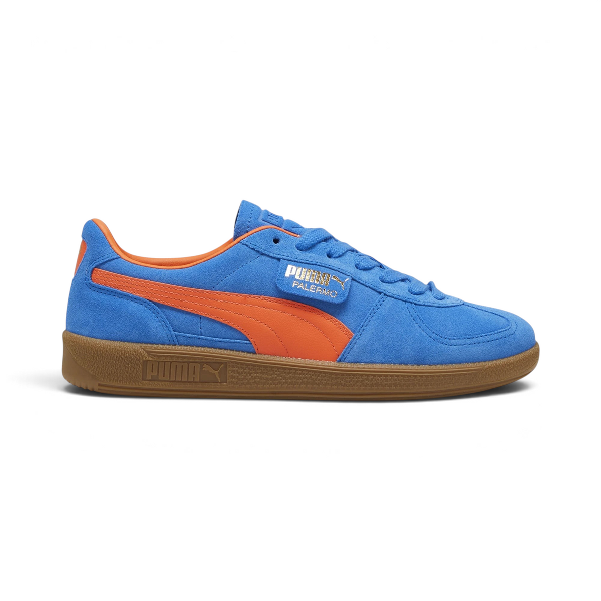 Highlights the high-velocity sweep of the flame orange leather Formstrip, showing the professional, rich sheen of the Hyperlink Blue suede upper and the shining gold foil Palermo branding flap. Main image