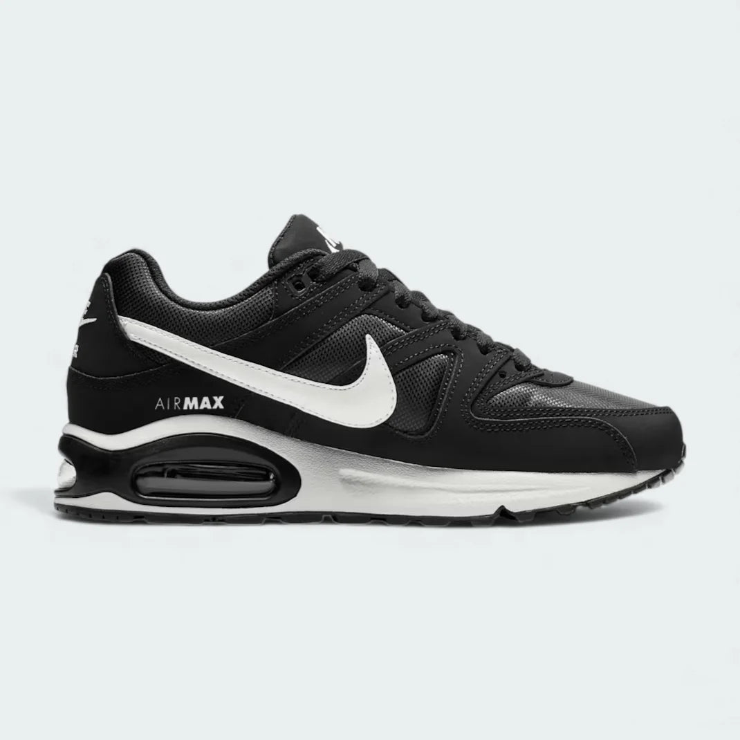Nike Air Max Command Women's trainers in black, side profile showing mesh and leather upper, visible Max Air unit in heel, and classic Swoosh.