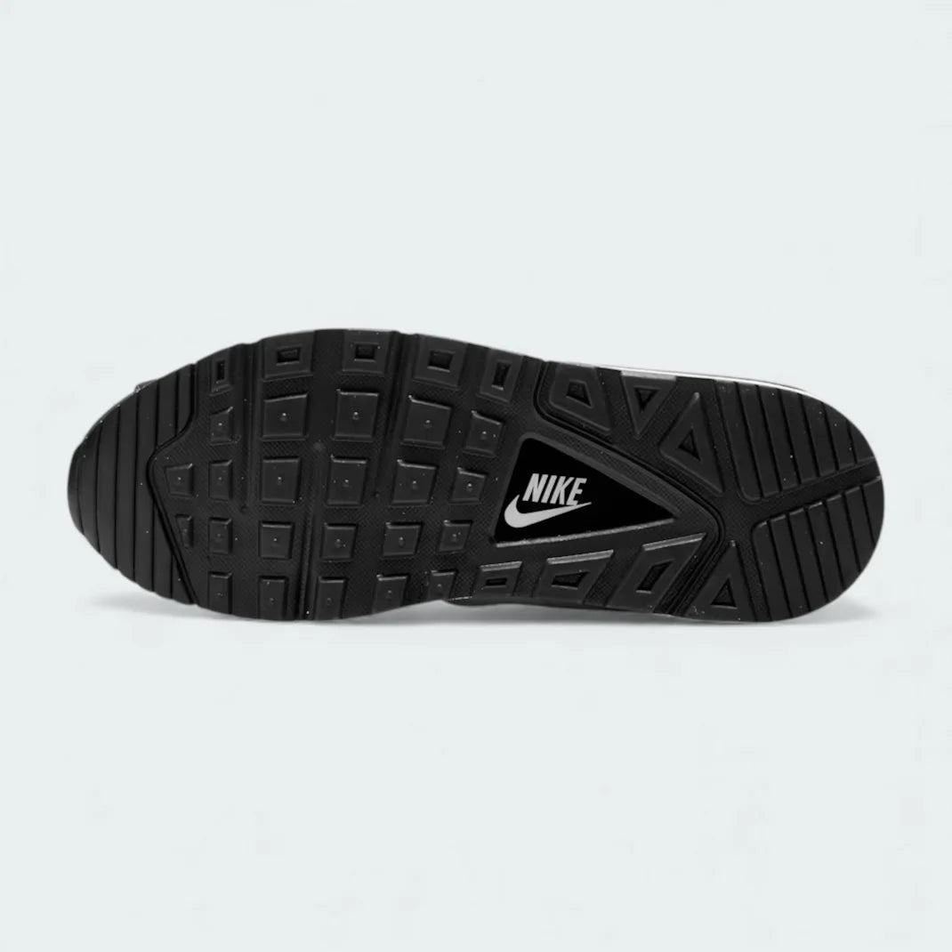 View of the outsole of the Nike Air Max Command Women's black trainers, showing the durable rubber tread pattern for reliable traction.