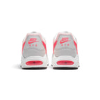 Focuses on the rear profile, highlighting the White leather heel counters stamped with Hyper Punch "NIKE AIR" logos and the wide stack of the foam midsole base.