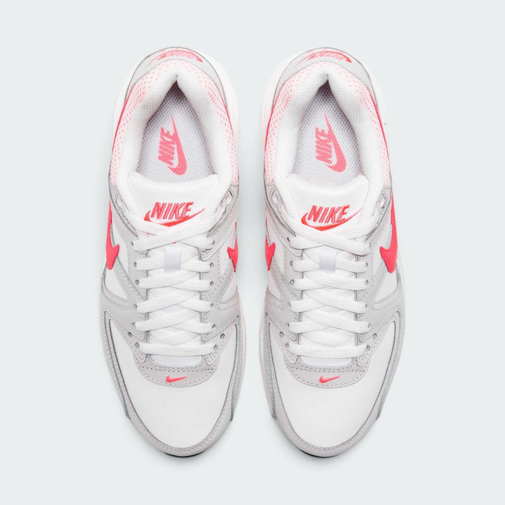 Focuses on the locked-in central lacing layout, displaying white mesh tongues, matching laces, Hyper Punch top eyelets, and insoles printed with Nike Air Max logos.