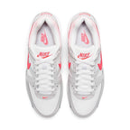 Focuses on the locked-in central lacing layout, displaying white mesh tongues, matching laces, Hyper Punch top eyelets, and insoles printed with Nike Air Max logos.