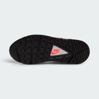 Displays the full-length black rubber sole, showcasing the iconic waffle lug pattern engineered for heritage traction and durable street grip.